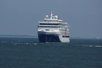 Cruise ship and shrimp cutter on the North Sea