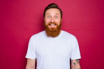 Happy isolated man with beard and white t-shirt