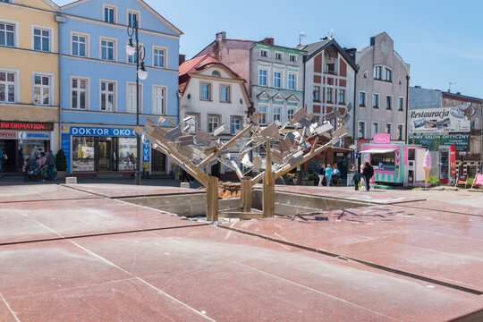 Bytow, Poland - May 31, 2021: Water fountain on market square in Bytow.