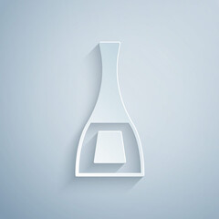Paper cut Bottle of nail polish icon isolated on grey background. Paper art style. Vector
