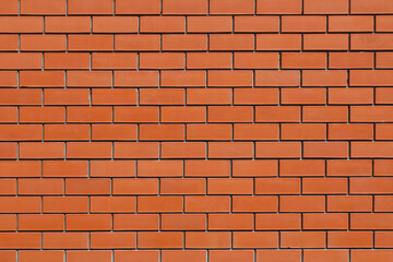 Red brick wall. Close-up. Background. Texture.