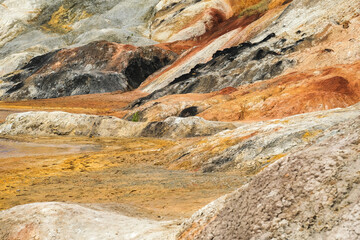 Fototapeta na wymiar Mountain textures, stone, water. Beautiful background. Clay quarry. Beautiful landscapes.