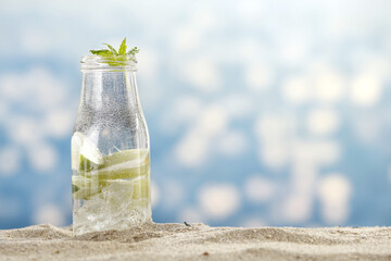 Summer drink on sand and free space for your decoration 