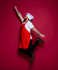 man chef jumps and acts like a super hero
