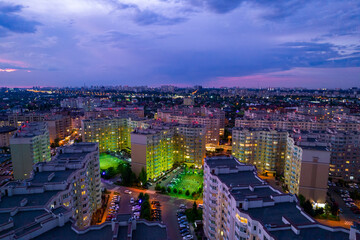 Fototapeta premium Aerial view of the city at sunset