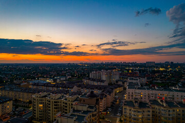 Fototapeta premium Aerial view of the city at sunset