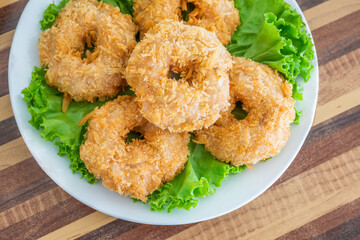 Fried shrimp ball cake on dish with plum sauce dipping. Local food in Thailand and Chinese. Regional Food Backgrounds