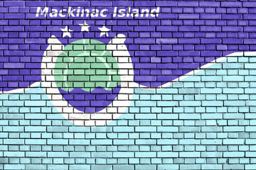 flag of Mackinac Island, Michigan painted on brick wall