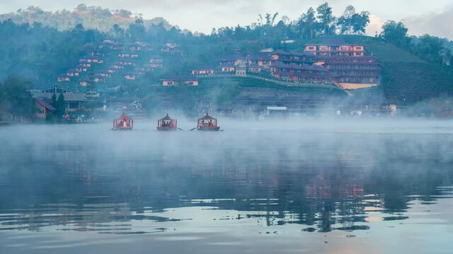 Time lapse of Tourists take a boat at Ban Rak Thai village in Mae Hong Son province, Thailand.