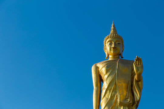 The standing buddha with blue sky, Copy space 