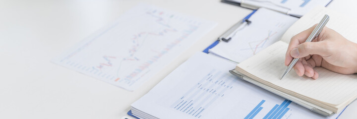 Man Analysis Business Accounting working with Individual income tax return.Accounting