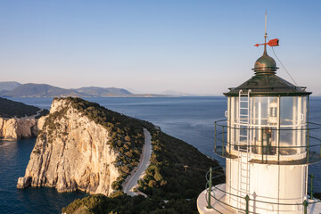 Fototapeta na wymiar Close up view of white lighthouse at island Lefkada. Cape of Ducato
