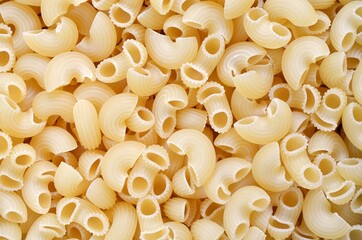 Uncooked pipe rigate macaroni as a background
