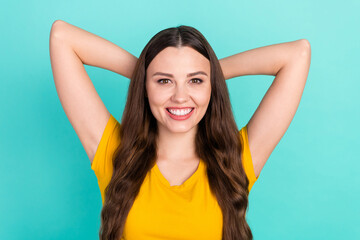Photo of friendly millennial lady hands head wear yellow t-shirt isolated on vivid teal color...