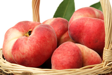 chinese flat peaches on white background 