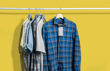 new clothes hang on the rack with a price tag label template mockup
