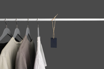 new clothes hang on the rack with a price tag label template mockup