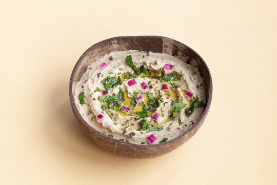 Tasty Baba ghanoush dish in bowl on table