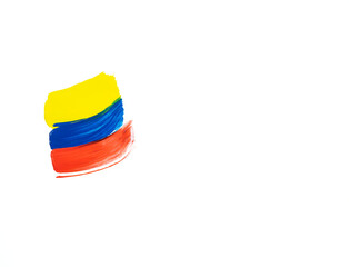 Fototapeta premium Painting on white background in yellow, blue and red colors. Copy space.