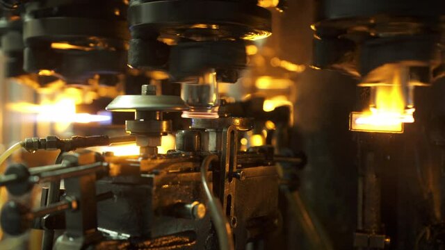 Close-Up Shot Of Flames On Glass Jars Production In Industry - Stuttgart, Germany
