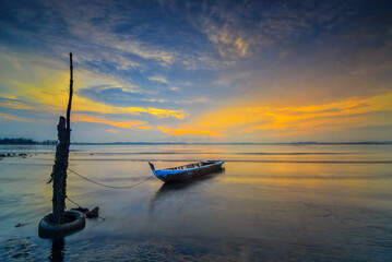boat at sunset in batam island 