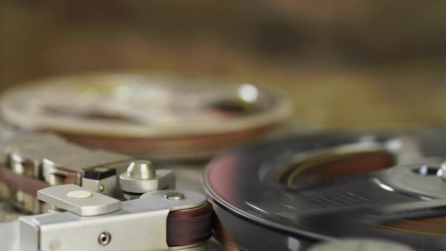 Old vintage reel-to-reel player. Tape recorder with spools. Bobbin tape recorder.	