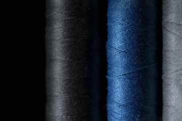 close-up of threads with black background
