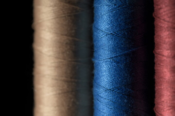 close-up of threads with black background