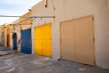 Fishermen's warehouses and colorful wooden doors