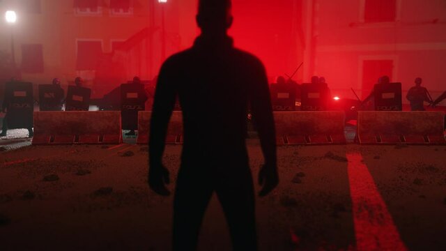 Man standing in front of riot police. Concept of revolution, protest, demonstration, riots