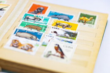 Fototapeta na wymiar album of old postage stamps with postage stamps