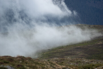 Fog on a mountain range in the Carpathian mountains