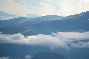 Fog on a mountain range in the Carpathian mountains