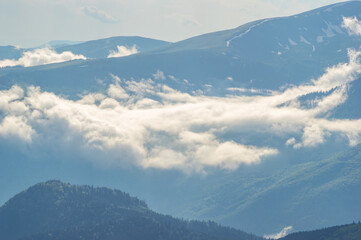 Fog on a mountain range in the Carpathian mountains