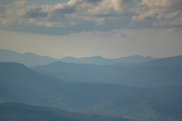 Fog on a mountain range in the Carpathian mountains