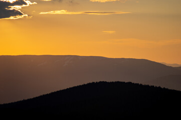 Beautiful orange sky during dusk in the carpathian mountains
