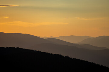 Beautiful orange sky during dusk in the carpathian mountains