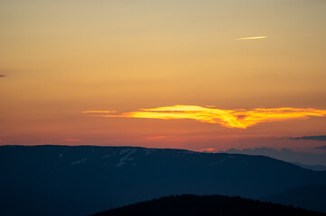 Beautiful orange sky during dusk in the carpathian mountains