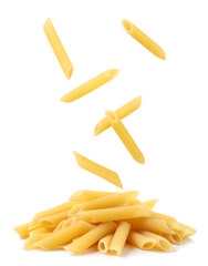 Raw pasta falling on a pile on a white background. Isolated