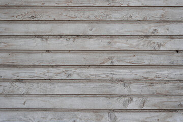 Gray wooden background with old painted boards. Gray wall 