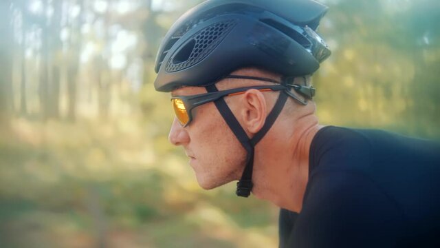 Hard Sport Workout.Triathlete Cyclist Training On Bicycle.Fit Athlete Sport Workout Training Cycling Triathlon Competition.Cyclist Fitness Riding On Road Bike Ready For Triathlon Race.Recreation Sport