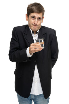 Young Handsome Tall Slim White Man With Brown Hair With Glass Full Of Water In Black Blazer Isolated On White Background