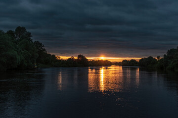 The reflection of the sunset in the water