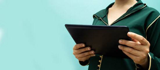 close up hands woman using tablet, laptop and cellphone connecting wifi