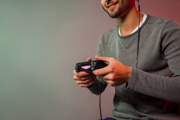 Man holding joystick and play virtual game