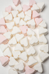 Marshmallows. Background or texture of colorful mini marshmallows.
pink marshmallow in the form of a heart.