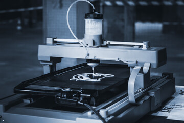Fototapeta na wymiar 3d printer that printing a liquid dough. 3D printer printing pancakes