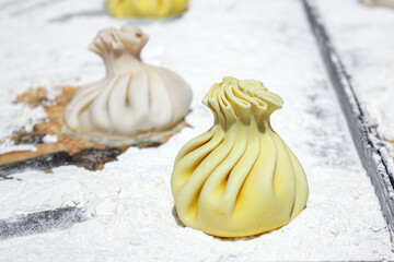 Khinkali dish of Georgian cuisine khinkal dumplings stuffed meat or vegetables on the table healthy food meal snack copy space food background rustic. top view