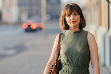 Woman walking in the city © AndyPhoton