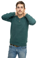 Young handsome tall slim white man with brown hair holds his neck in dark green sweater in blue jeans isolated on white background